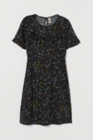 Vestido con volantes 12.99 €