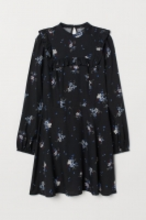  Vestido con volante 14.99 €