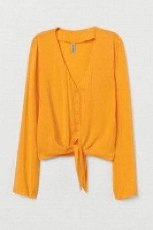  Blusa anudada con cuello en V 10.99 €