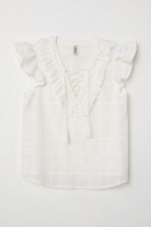  Top con volantes 16.99 €