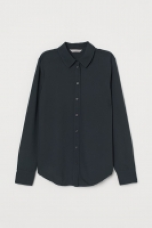  Blusa en tejido de crepé 8.99 €