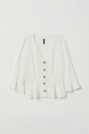  Blusa con volante 13.99 €