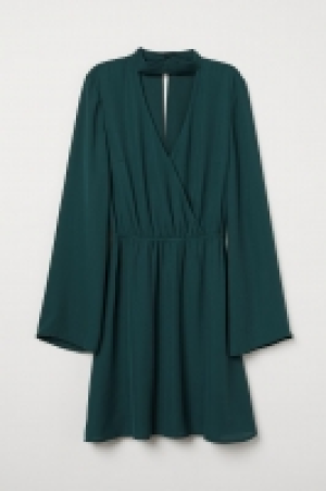 Vestido cruzado en V 19.99 €