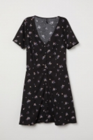 Vestido con botones 9.99 €