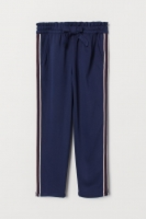  Pantalón con franjas laterales 6.99 €