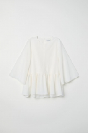  Blusa con volantes 29.99 €