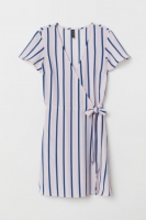  Vestido cruzado con estampado 11.99 €