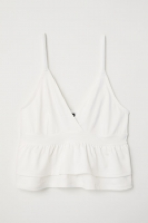  Top corto con volantes 8.99 €