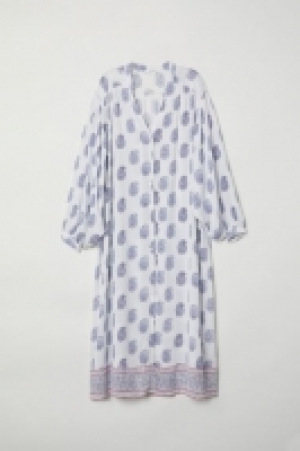  Vestido con botones 17.99 €
