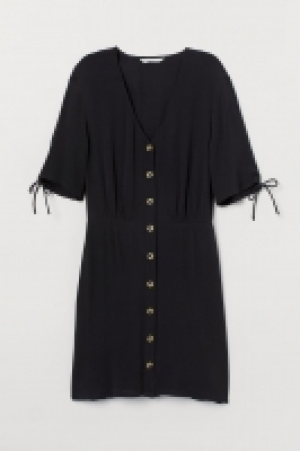  Vestido en crepé 11.99 €