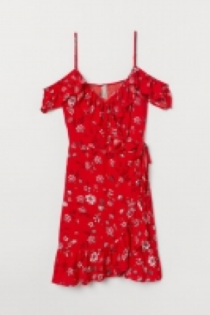  Vestido cruzado con volantes 14.99 €