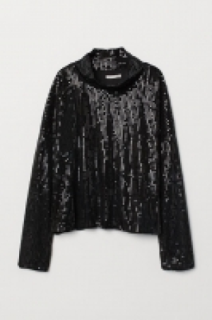  Top con lentejuelas 17.99 €