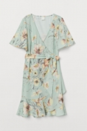  Vestido cruzado en V 17.99 €