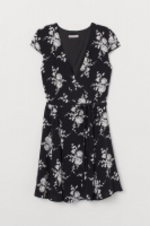  Vestido en crepé 14.99 €