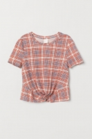  Camiseta con detalle de nudo 1.99 €
