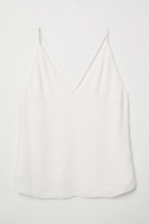  Top con escote de pico 12.99 €