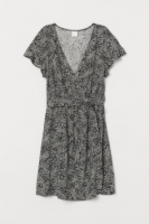  Vestido con cinturón de anudar 11.99 €