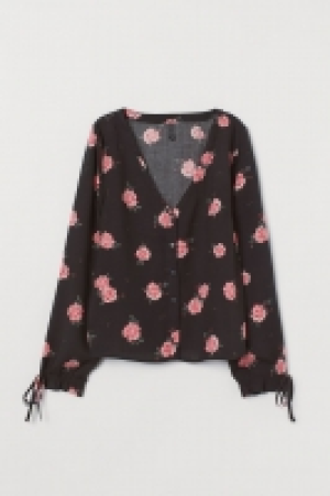  Blusa con botones 6.99 €