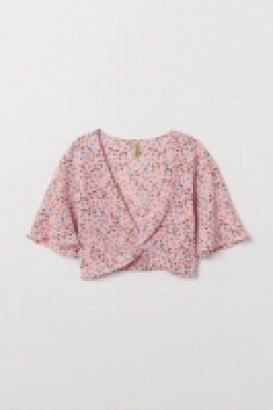  Blusa con escote de pico 6.99 €