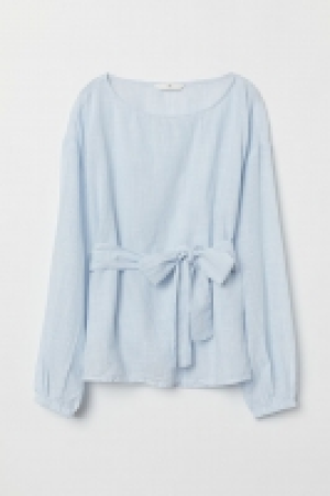  Blusa con cinturón de anudar 7.99 €