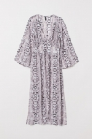 HM   Blusa larga con botones