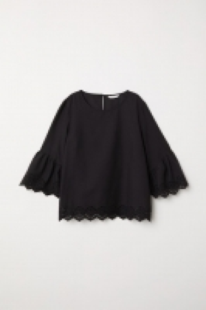 HM   Blusa con mangas trompeta