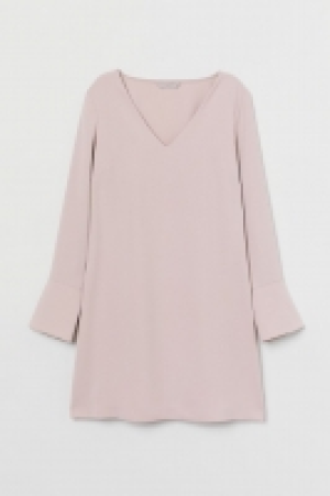 Vestido con escote de pico 19.99 €