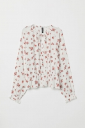 Blusa con botones 6.99 €