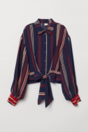 Blusa con lazada 19.99 €