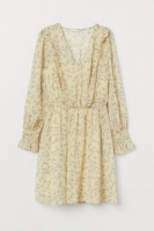 Vestido de gasa cuello en V 14.99 €
