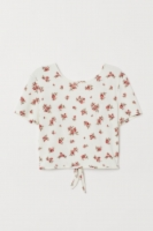 Top con espalda abierta 3.99 €