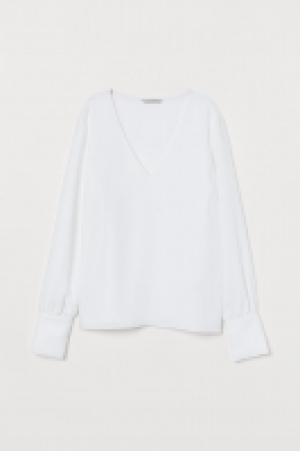 Blusa con escote de pico 8.99 €