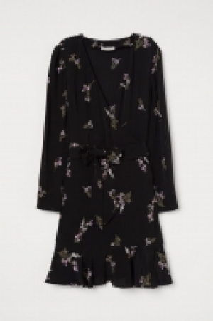 Vestido con escote de pico 20.99 €