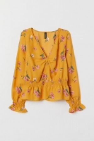 Blusa con nudo decorativo 8.99 €