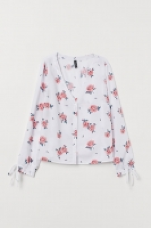 Blusa con botones 8.99 €