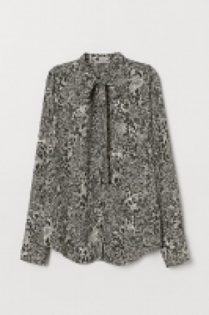 Blusa con lazada 8.99 €