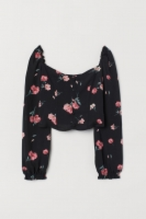 Blusa con mangas abullonadas 8.99 €