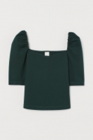 Top con mangas abullonadas 8.99 €
