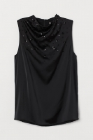 Blusa con lentejuelas 15.99 €