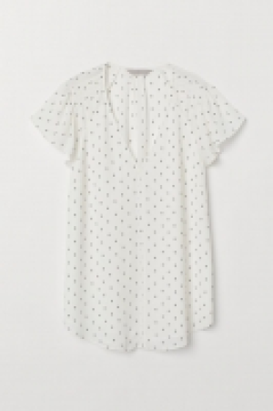 Blusa con manga circular 12.99 €