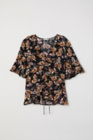 Blusa con cordón de ajuste 9.99 €
