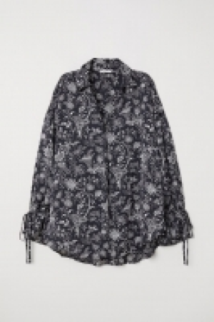 Camisa amplia 11.99 €
