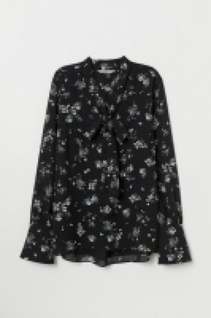 Blusa con lazada 14.99 €