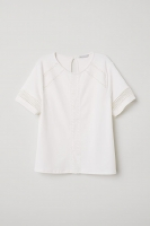 Top con encaje 14.99 €