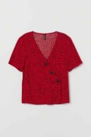 Blusa con escote de pico 7.99 €