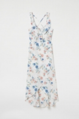 Vestido cruzado con volantes 23.99 €