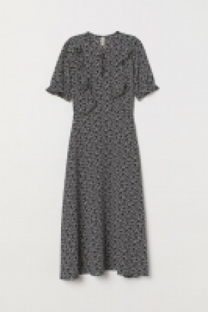 Vestido con volante 20.99 €