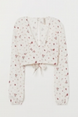 Blusa de anudar 11.99 €