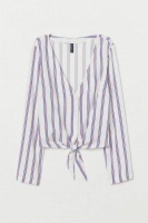 HM  Blusa de viscosa con lazada