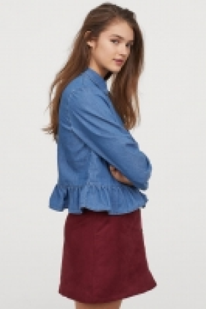 Blusa denim con volante 20.99 €